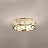 Modern Brass Flush Mount Ceiling Light with Textured Glass Shade for Indoor Spaces