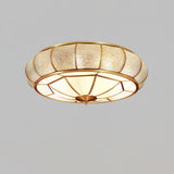 Modern Brass Flush Mount Ceiling Light with Textured Glass Shade for Indoor Spaces