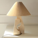 artistic-ruins-sculptural-resin-table-lamp-with-pleated-linen-shade-for-living-room
