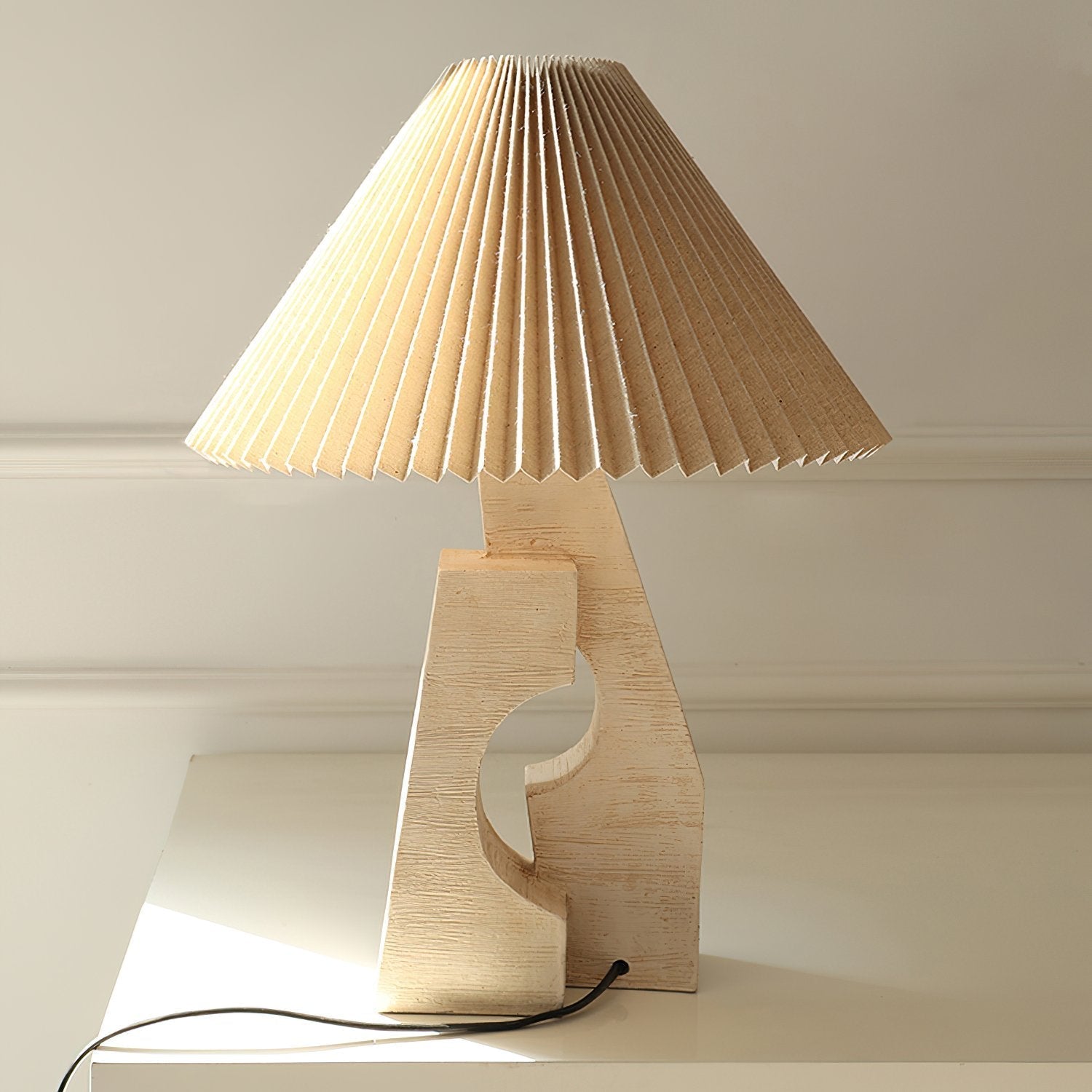 artistic-ruins-sculptural-resin-table-lamp-with-pleated-linen-shade-for-living-room