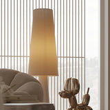 modern-ruma-fabric-floor-lamp-with-creamy-base-and-foot-switch-for-elegant-home-decor