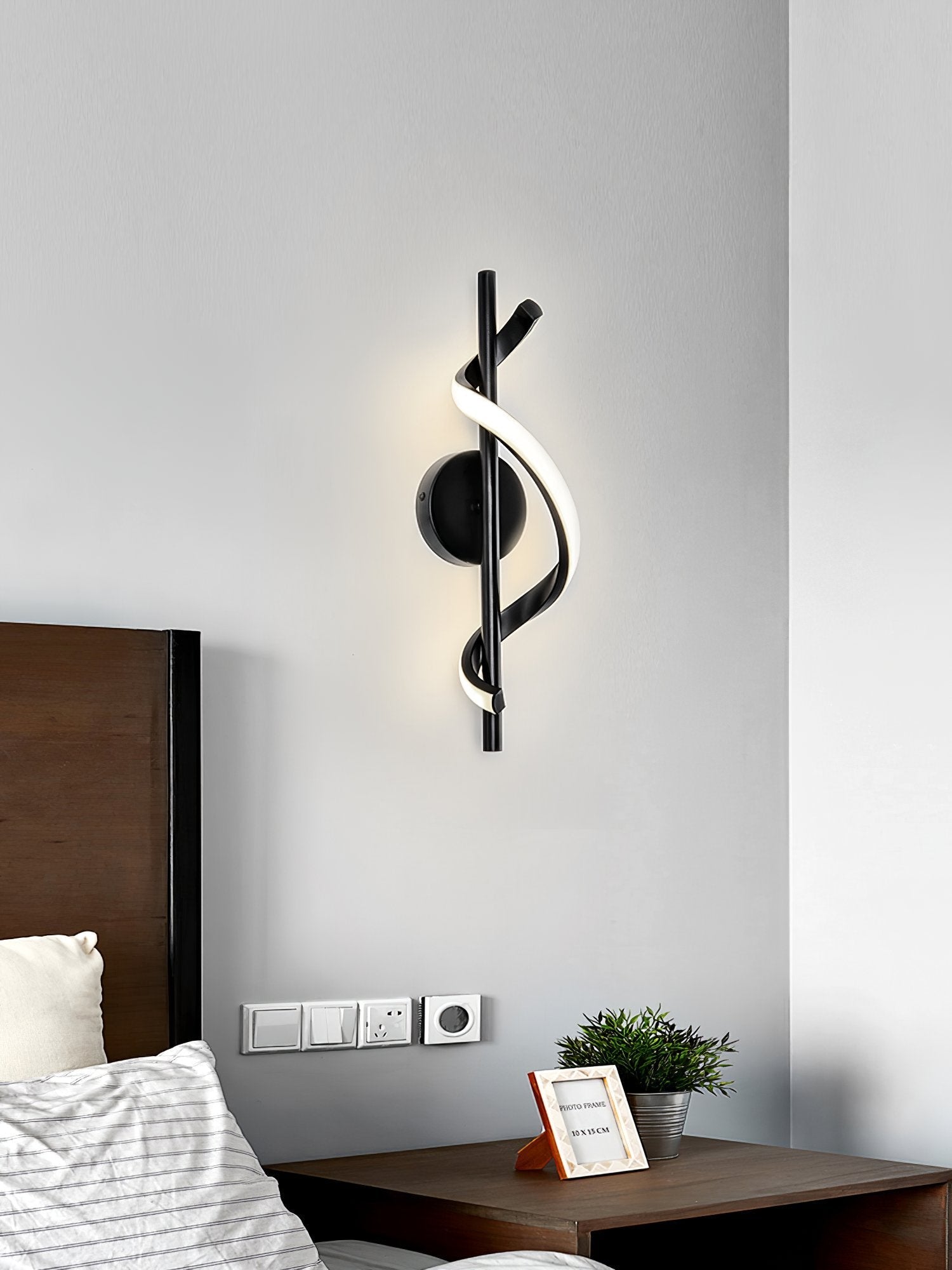 modern-s-shaped-led-wall-sconce-with-three-color-temperature-modes-in-black-finish