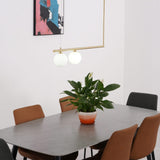 modern-geometric-satellite-pendant-light-with-opal-glass-globes-and-adjustable-brass-arms