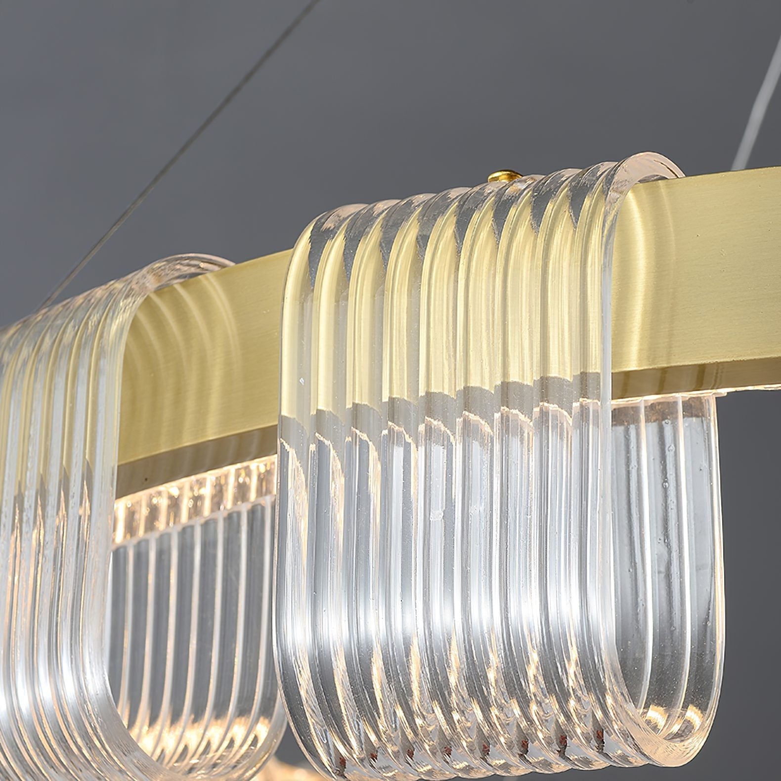 modern-gold-saturno-ring-led-chandelier-with-tetrahedral-acrylic-diffusers