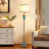Art Deco Resin Floor Lamp with Fluted Base and White Fabric Shade for Home Decor