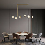modern-sofia-6-light-linear-brass-chandelier-with-transparent-acrylic-shades