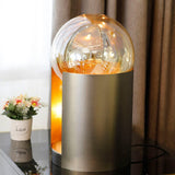modern-amber-blown-glass-table-lamp-with-black-metal-base-and-e14-light-source
