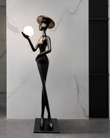 contemporary-sculpture-floor-lamp-with-fiberglass-body-and-glass-globe-shade-for-luxury-interiors