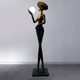 contemporary-sculpture-floor-lamp-with-fiberglass-body-and-glass-globe-shade-for-luxury-interiors