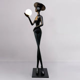 contemporary-sculpture-floor-lamp-with-fiberglass-body-and-glass-globe-shade-for-luxury-interiors