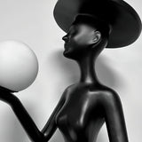 contemporary-sculpture-floor-lamp-with-fiberglass-body-and-glass-globe-shade-for-luxury-interiors