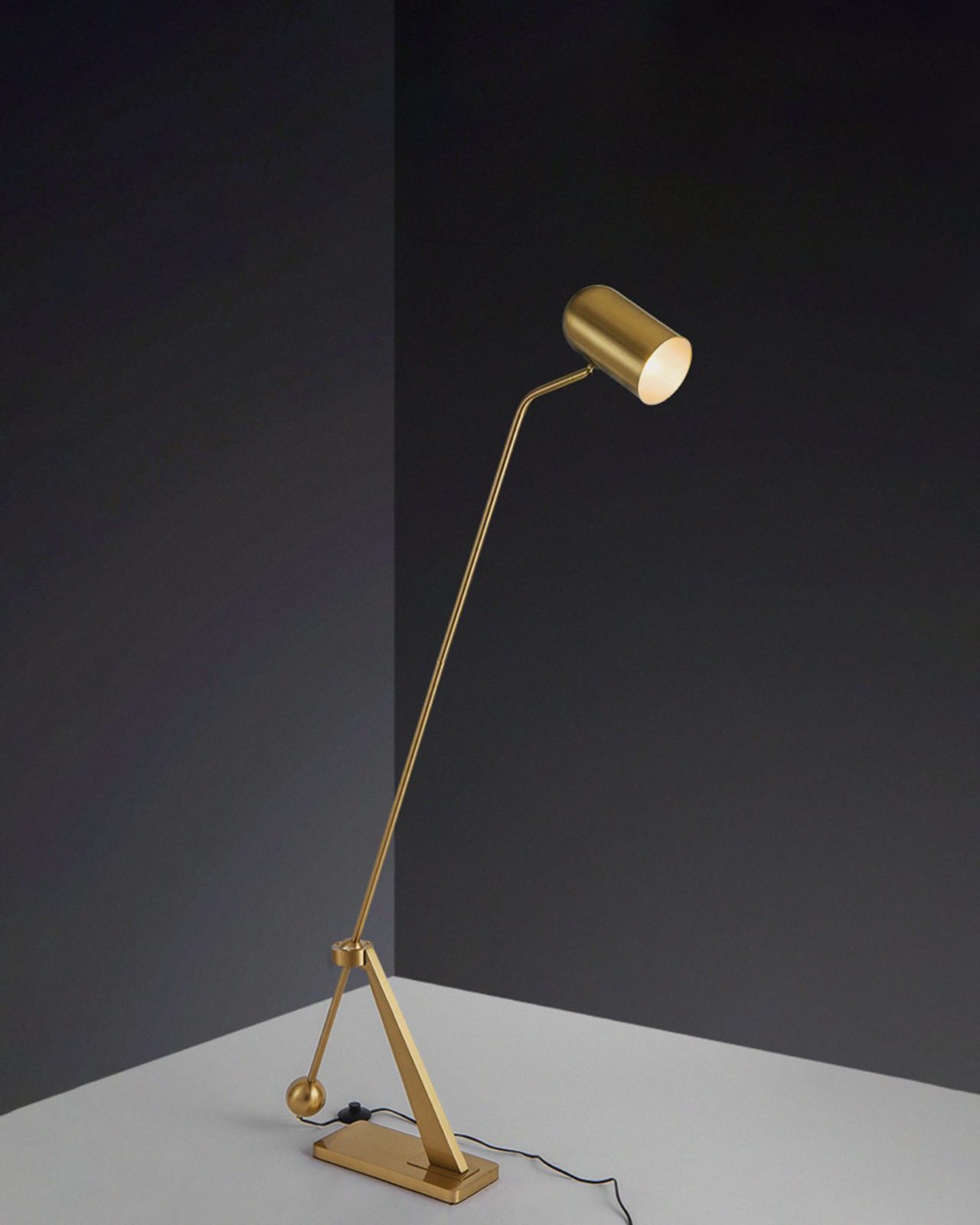 modern-stasis-floor-lamp-with-adjustable-copper-shade-and-brass-base