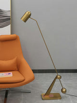 modern-stasis-floor-lamp-with-adjustable-copper-shade-and-brass-base