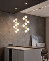 stella-modern-glass-globe-pendant-light-with-spherical-shades-and-brass-finish