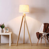 elegant-ash-wood-stilt-floor-lamp-with-white-fabric-shade-mid-century-modern-standing-light