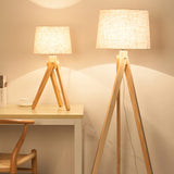 elegant-ash-wood-stilt-floor-lamp-with-white-fabric-shade-mid-century-modern-standing-light