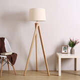 elegant-ash-wood-stilt-floor-lamp-with-white-fabric-shade-mid-century-modern-standing-light