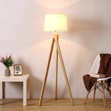 elegant-ash-wood-stilt-floor-lamp-with-white-fabric-shade-mid-century-modern-standing-light