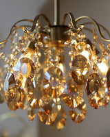 modern-wedge-shaped-gold-and-crystal-pendant-light-for-dining-room-and-living-room