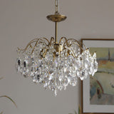 modern-wedge-shaped-gold-and-crystal-pendant-light-for-dining-room-and-living-room
