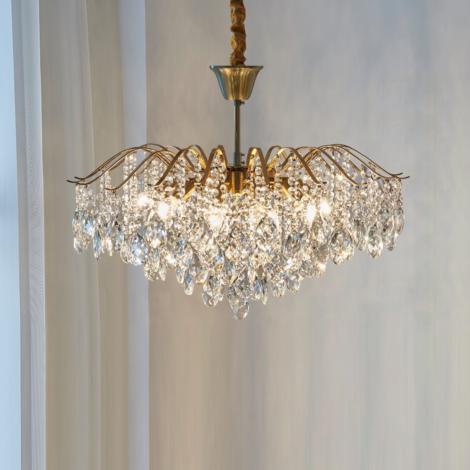 modern-wedge-shaped-gold-and-crystal-pendant-light-for-dining-room-and-living-room