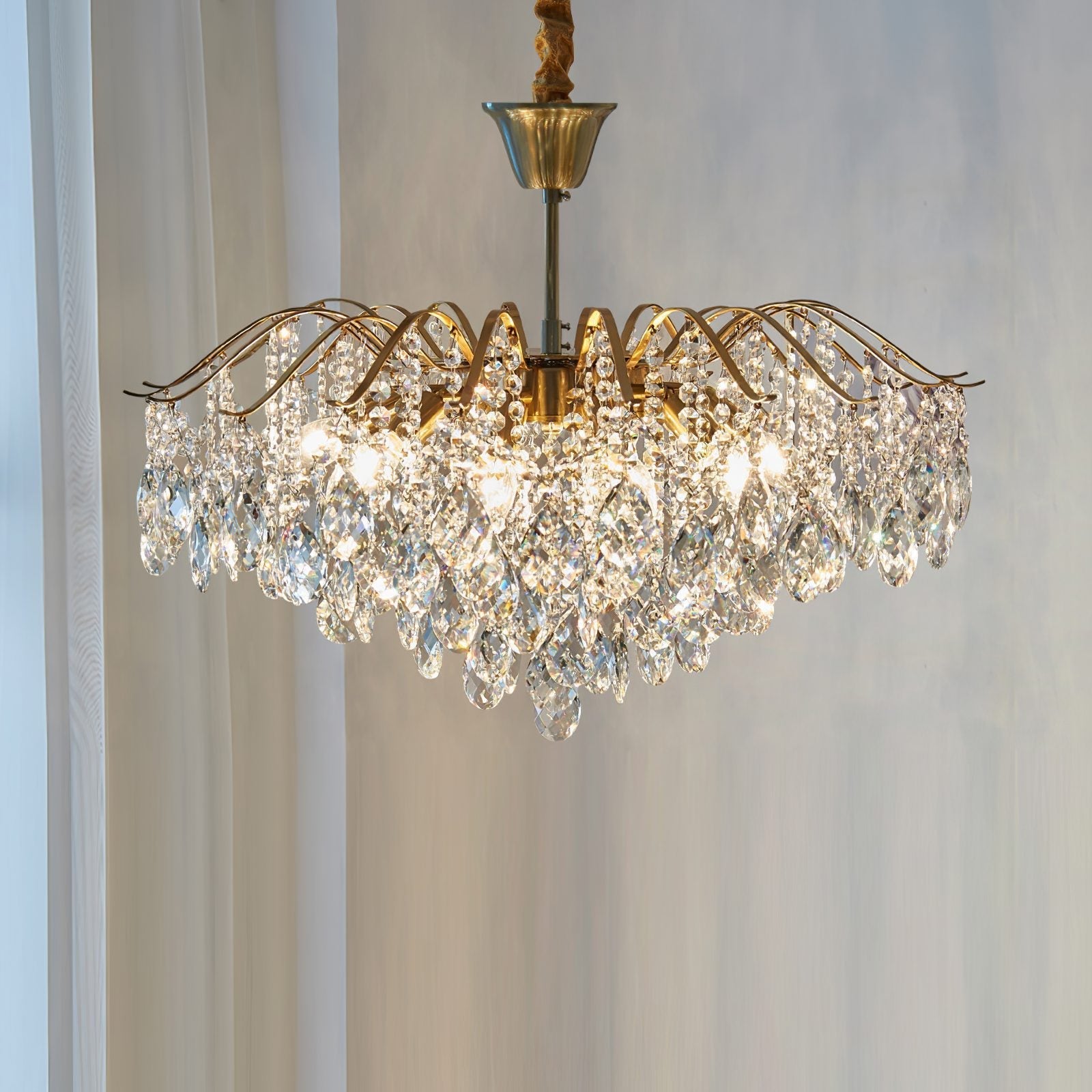 modern-wedge-shaped-gold-and-crystal-pendant-light-for-dining-room-and-living-room
