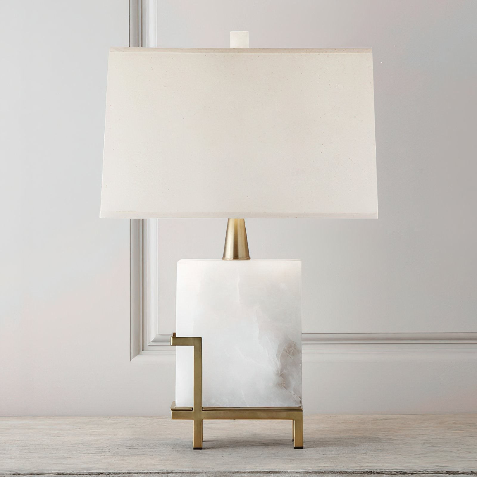 modern-brass-table-lamp-with-white-tapered-fabric-shade-and-natural-alabaster-base