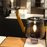 Modern Smoke Gray Glass Lantern Table Lamp with Contemporary Metal Frame for Bedside and Living Room