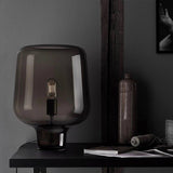 Modern Smoke Gray Glass Lantern Table Lamp with Contemporary Metal Frame for Bedside and Living Room