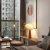 Tilt Hat Wooden Table Lamp with Conical Solid Wood Base and Triangular Fabric Shade for Modern Interiors