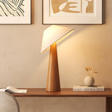 Tilt Hat Wooden Table Lamp with Conical Solid Wood Base and Triangular Fabric Shade for Modern Interiors