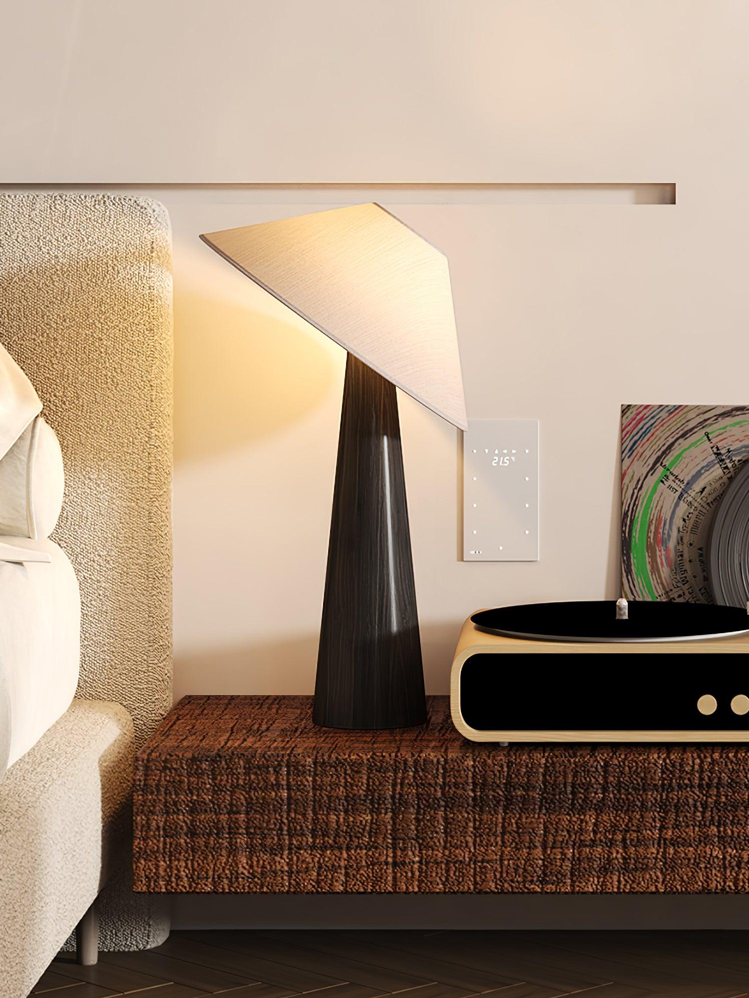 Tilt Hat Wooden Table Lamp with Conical Solid Wood Base and Triangular Fabric Shade for Modern Interiors