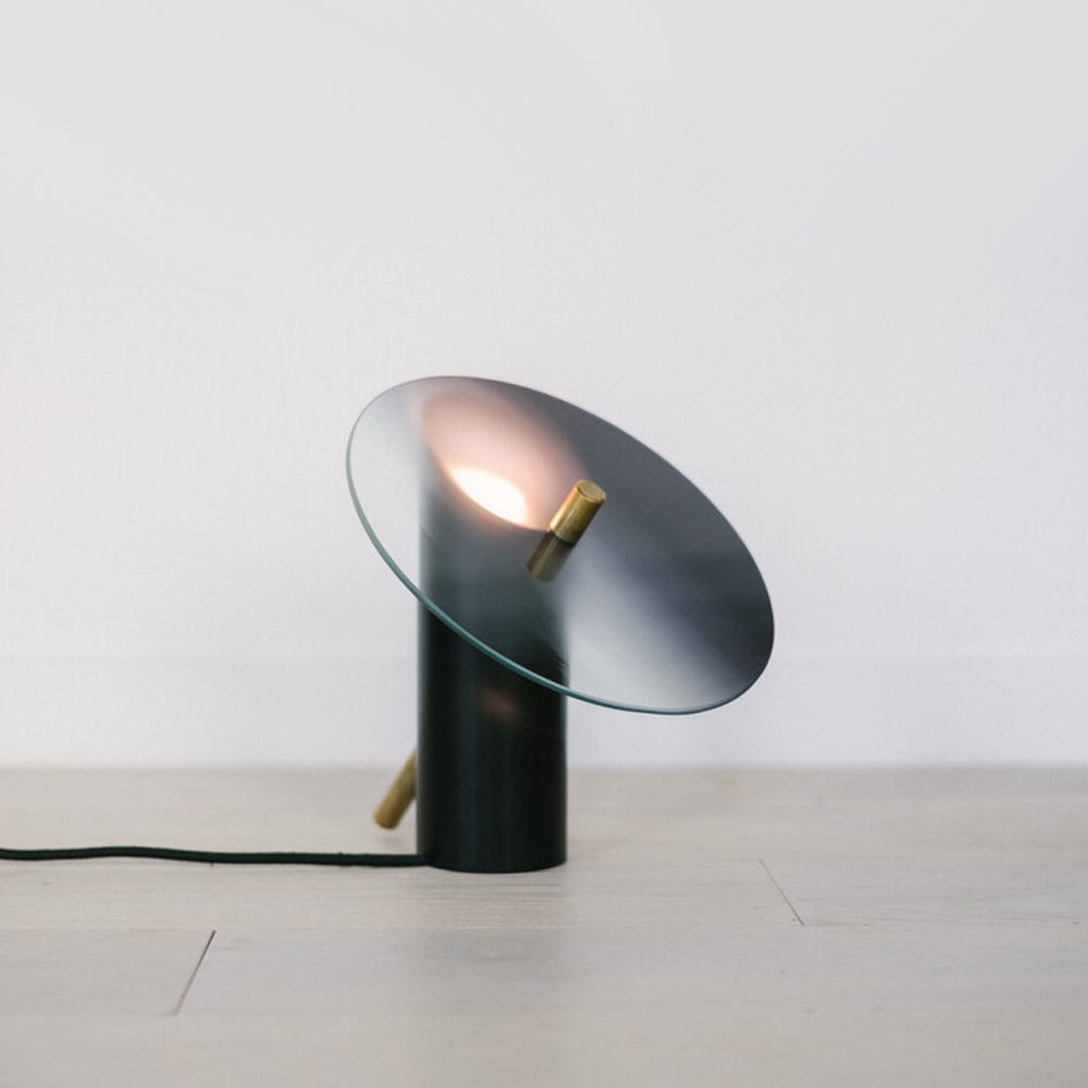 modern-interactive-glass-disc-table-lamp-with-rotating-brass-shaft-and-dimming-control