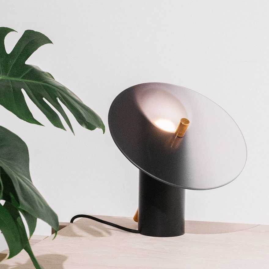 modern-interactive-glass-disc-table-lamp-with-rotating-brass-shaft-and-dimming-control