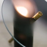modern-interactive-glass-disc-table-lamp-with-rotating-brass-shaft-and-dimming-control