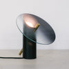 modern-interactive-glass-disc-table-lamp-with-rotating-brass-shaft-and-dimming-control