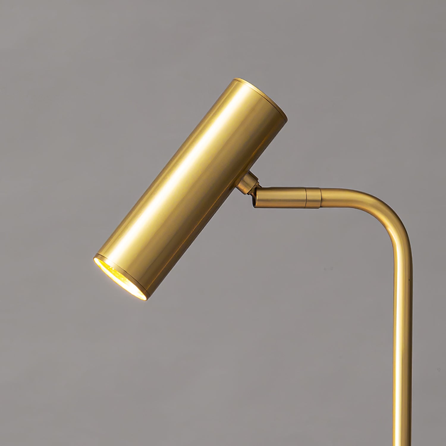 Modern Brass LED Table Lamp with Adjustable Head and Satin Finish Design