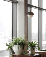modern-minimalist-perforated-metal-and-glass-globe-pendant-light-for-home-decor