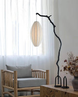 sculptural-tree-branch-standing-floor-lamp-with-elegant-fabric-lantern-shade