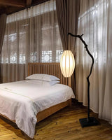 sculptural-tree-branch-standing-floor-lamp-with-elegant-fabric-lantern-shade