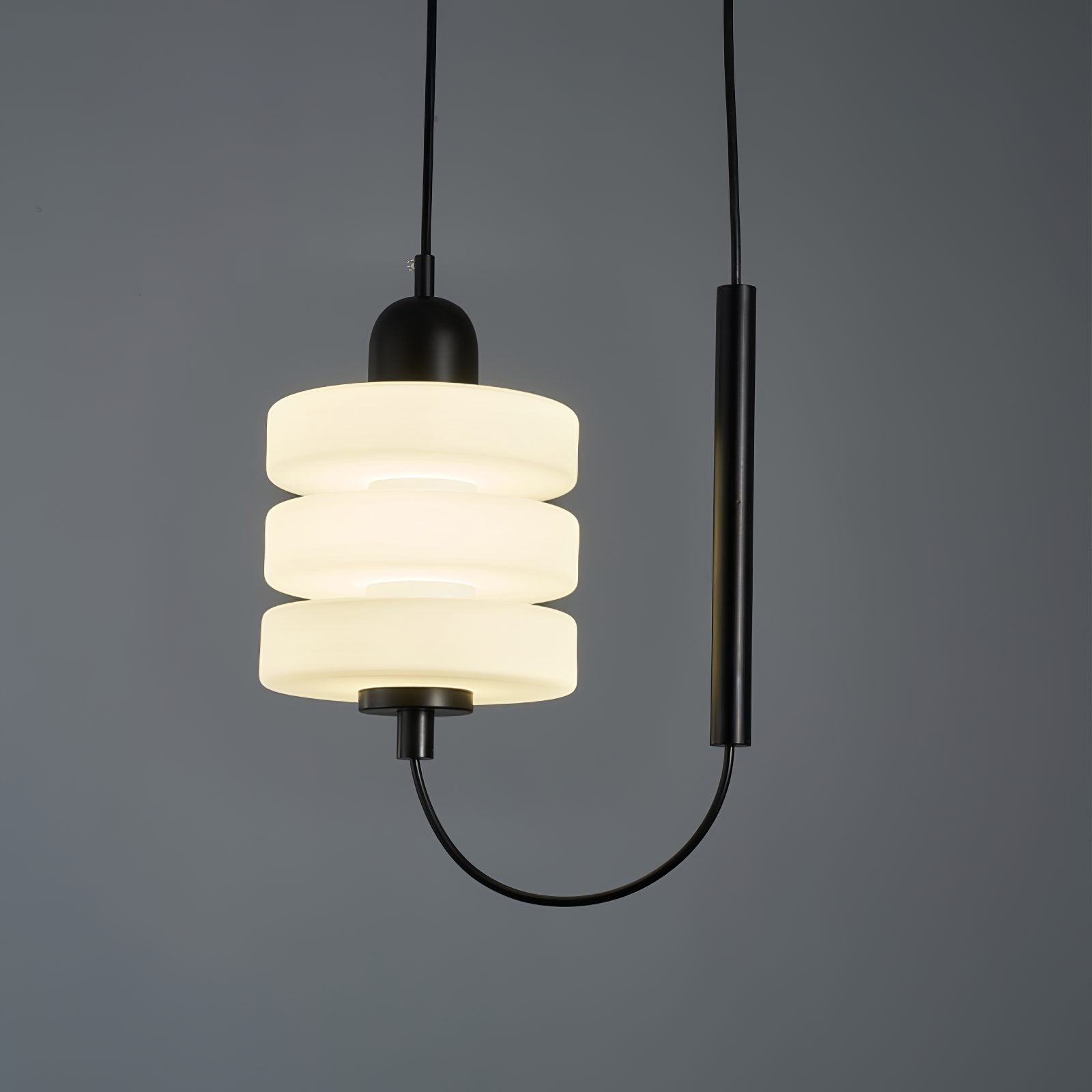 modern-triple-puck-led-pendant-light-with-ice-glazed-glass-diffuser-and-machined-iron-base