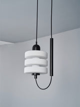 modern-triple-puck-led-pendant-light-with-ice-glazed-glass-diffuser-and-machined-iron-base
