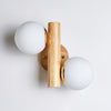 modern-tupelo-double-wooden-wall-sconce-with-rotatable-white-glass-shades-set-of-2-lighting