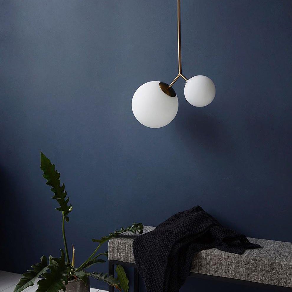 modern-asymmetric-glass-globe-pendant-light-with-brass-accents-and-hand-blown-glass