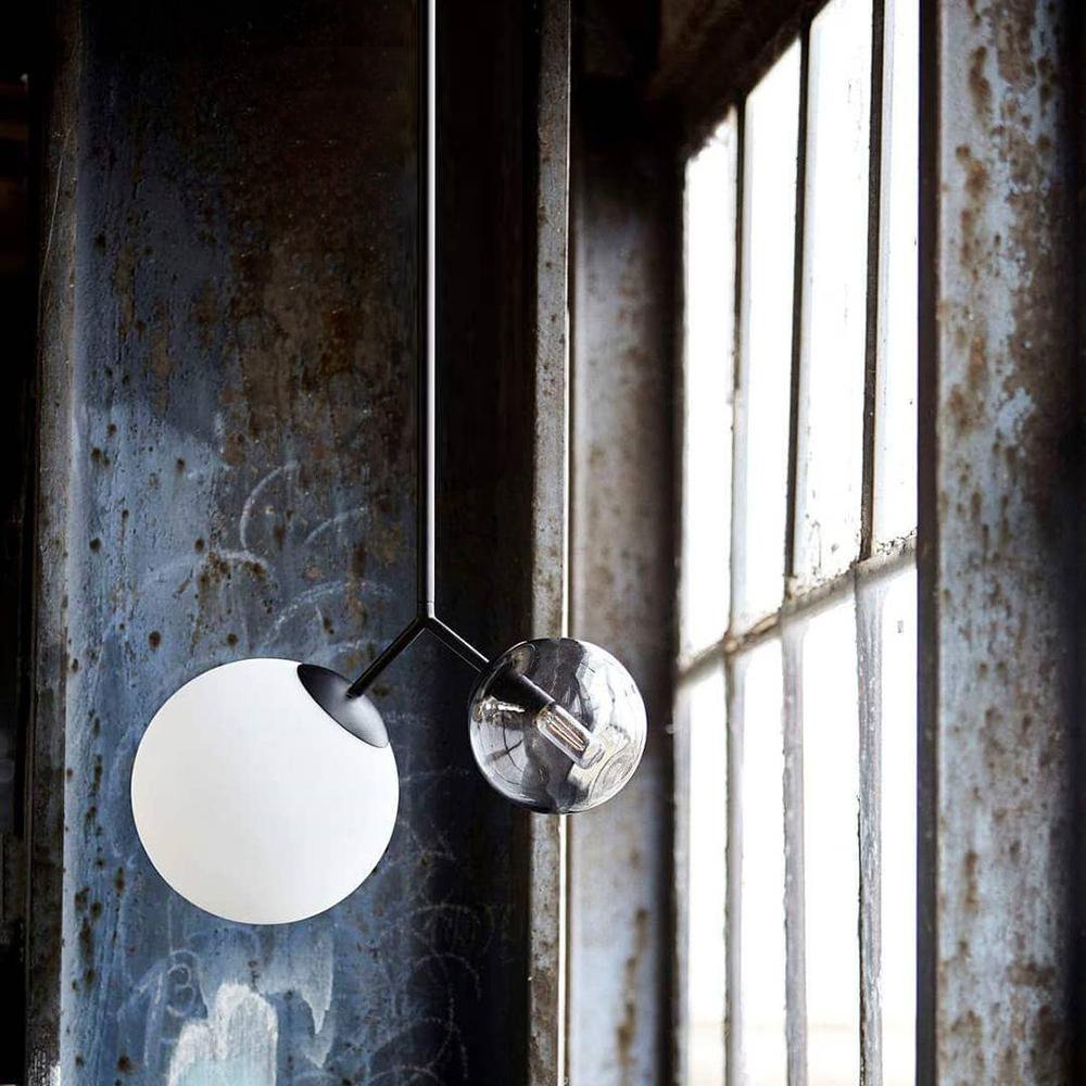modern-asymmetric-glass-globe-pendant-light-with-brass-accents-and-hand-blown-glass