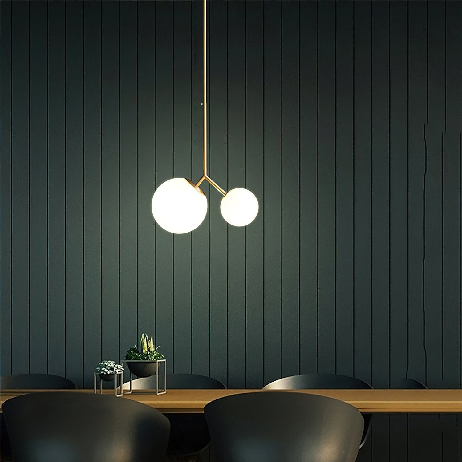 modern-asymmetric-glass-globe-pendant-light-with-brass-accents-and-hand-blown-glass