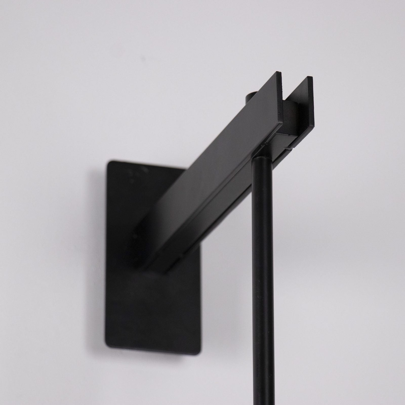 modern-vadim-glass-wall-sconce-with-perforated-metal-cage-and-brass-finish-for-luxury-interiors