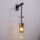 modern-vadim-glass-wall-sconce-with-perforated-metal-cage-and-brass-finish-for-luxury-interiors