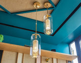 vadim-modern-glass-globe-pendant-light-with-gold-steel-rod-and-perforated-cage