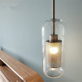 vadim-modern-glass-globe-pendant-light-with-gold-steel-rod-and-perforated-cage